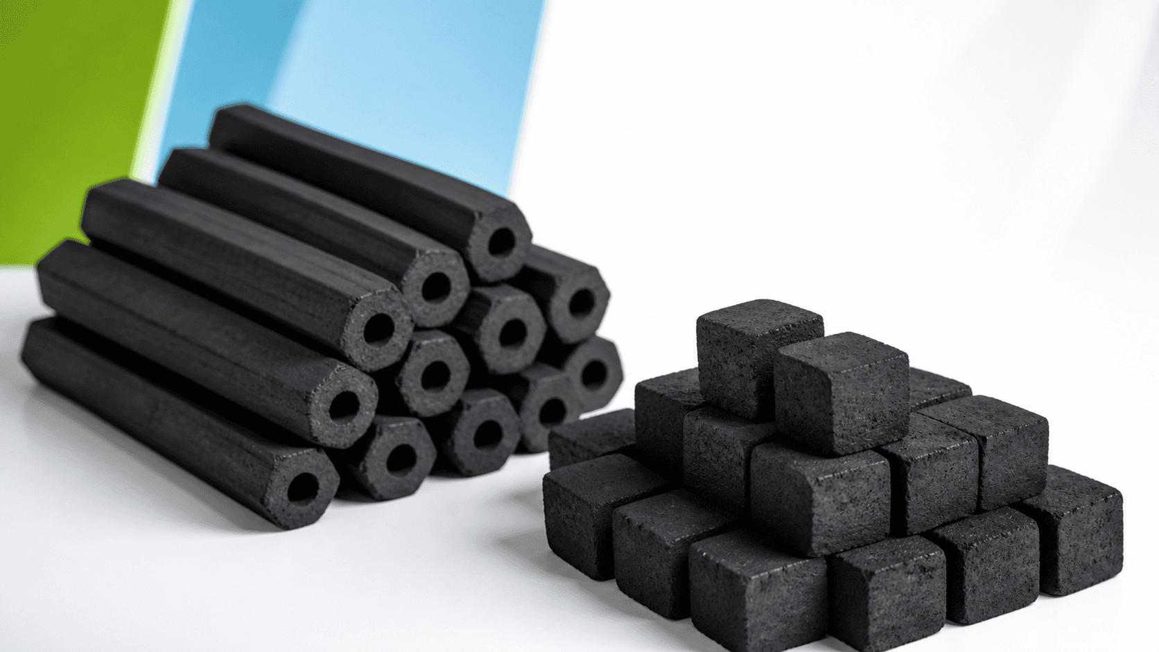 Cube and hexagonal coconut-shell briquettes shown as distinct formats.